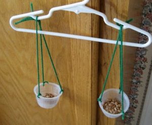 weighing herb using a hanger